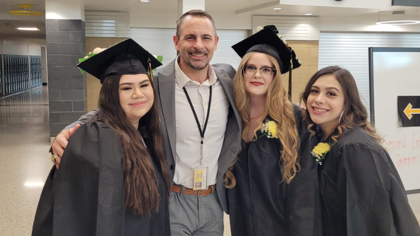 Chad Harlander and students at graduation